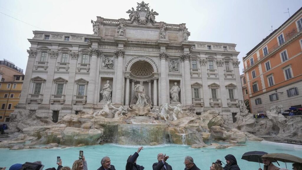 Tourists begin paying to see Rome's Trevi Fountain