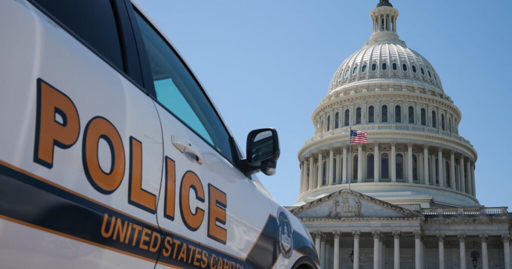 Police arrest man running toward the Capitol carrying shotgun, wearing tactical vest