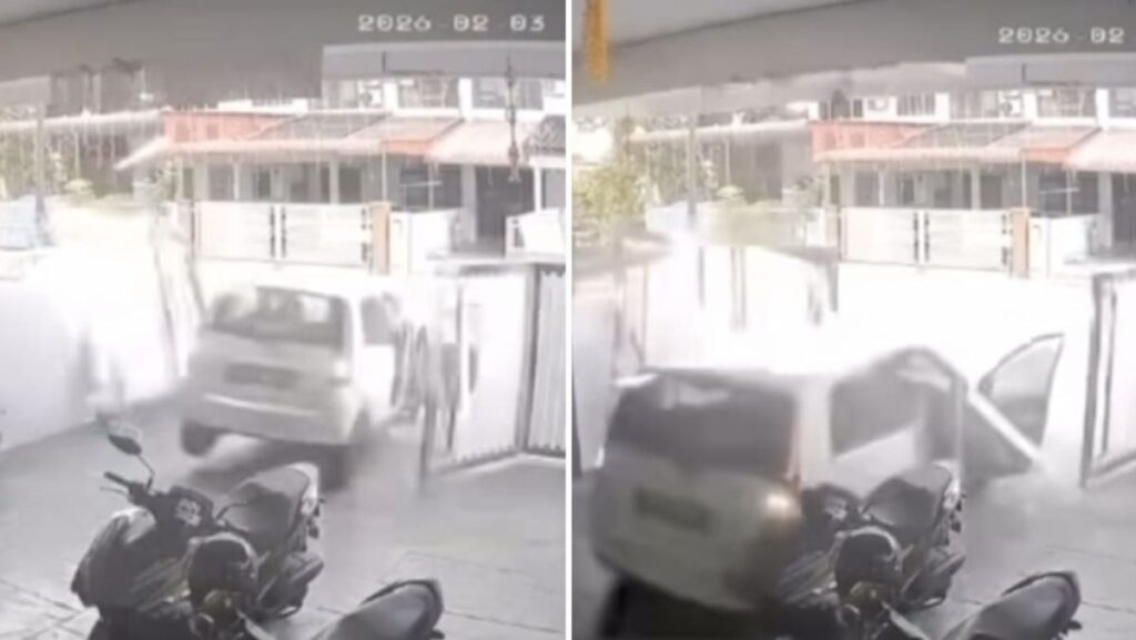 Reversing car smashes through neighbour’s fence in viral video in Malaysia