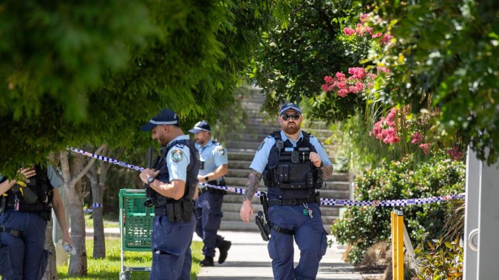 Two charged with murder after gangland-linked shooting