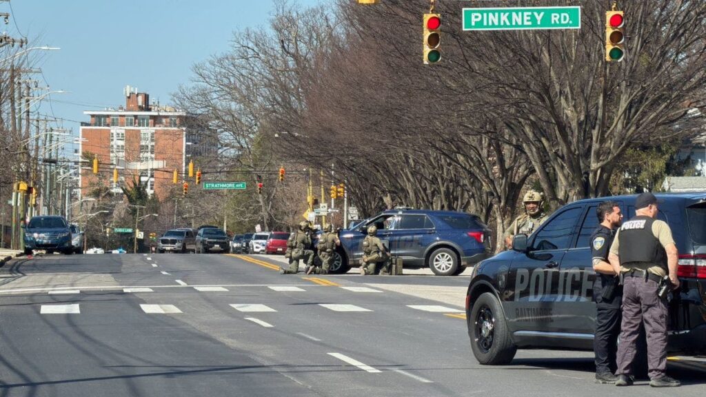 Suspect killed by SWAT sniper after holding woman hostage in Baltimore