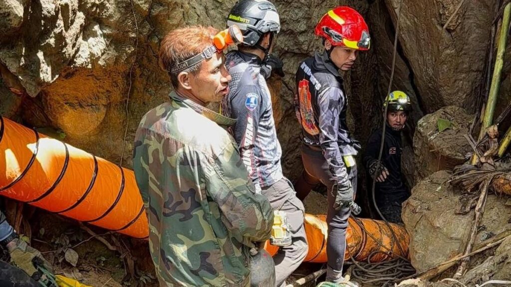 Rescuers race to reach seven trapped in a Laos cave