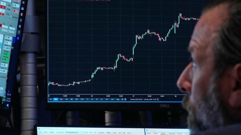 Wall St ends higher as SpaceX's market debut dominates