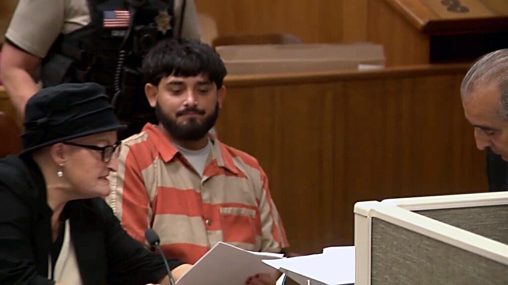 Illegal immigrant accused of triple murder smirks in California court