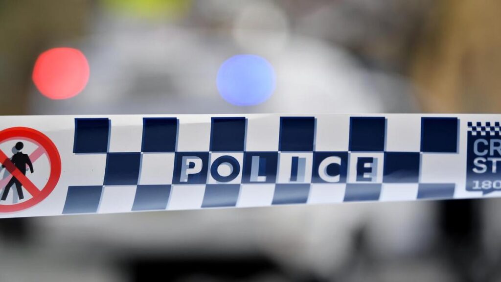 Son charged with murder after body found with burns