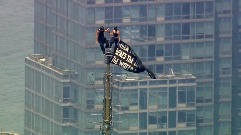 Daredevils unfurl proposal banner atop Empire State
