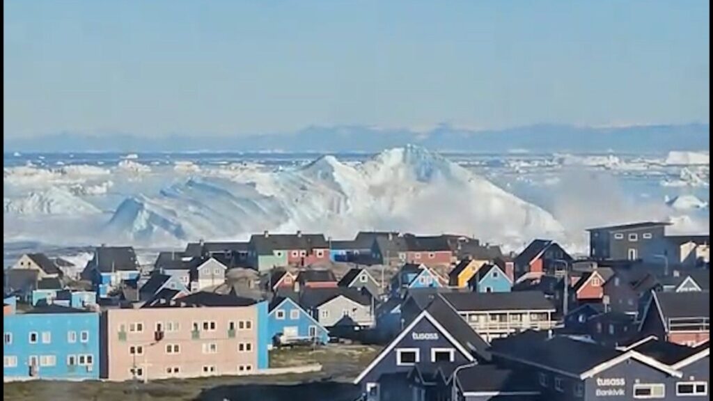 Massive iceberg capsizes off the coast of Greenland | Climate Crisis