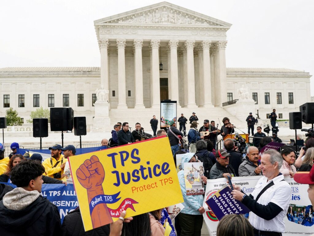 US judge blocks Trump bid to strip work permits from immigrants | Courts News