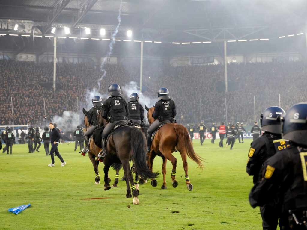 Fans and police injured in pitch invasion during ‘high risk’ German Cup tie | Football News
