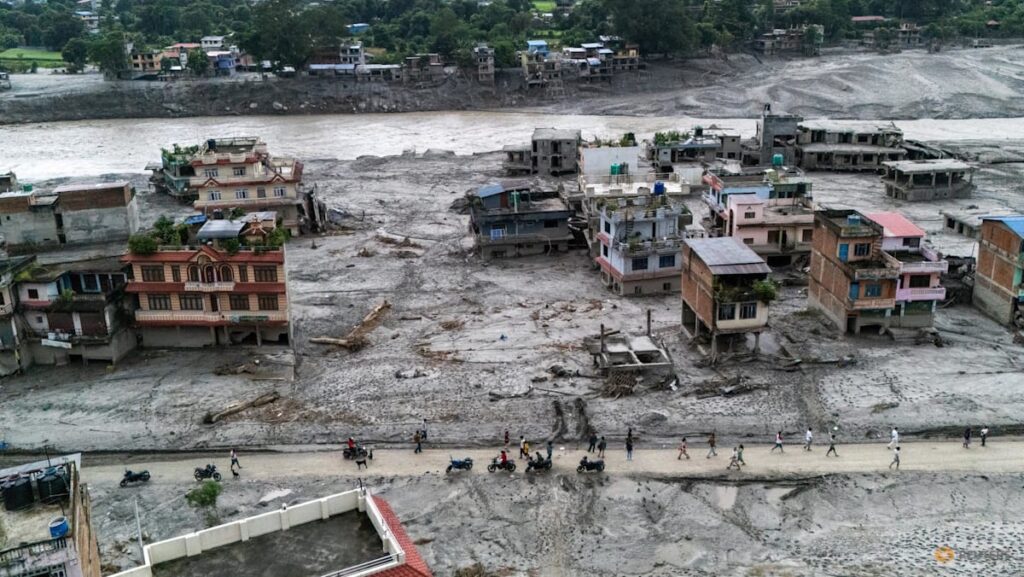 Rescuers dig into tunnel as missing toll from Nepal, China disaster nears 3,000