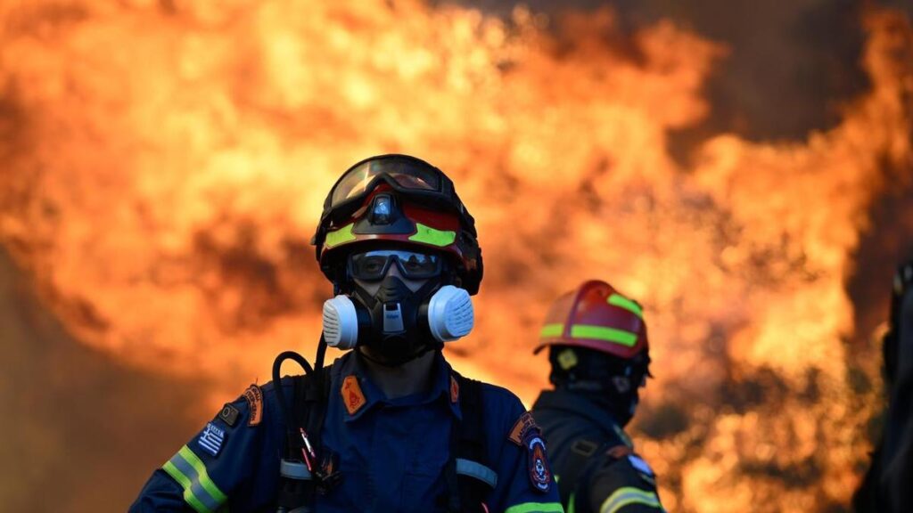Two helicopters collide as Greece battles wildfires
