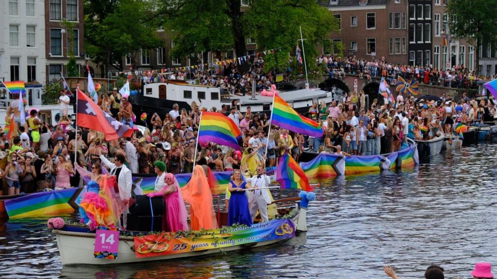 Hundreds of thousands line Amsterdam canals for Pride