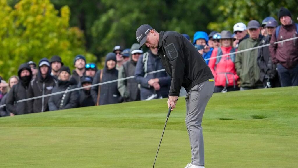 Dean delivers British Masters title with wife as caddie