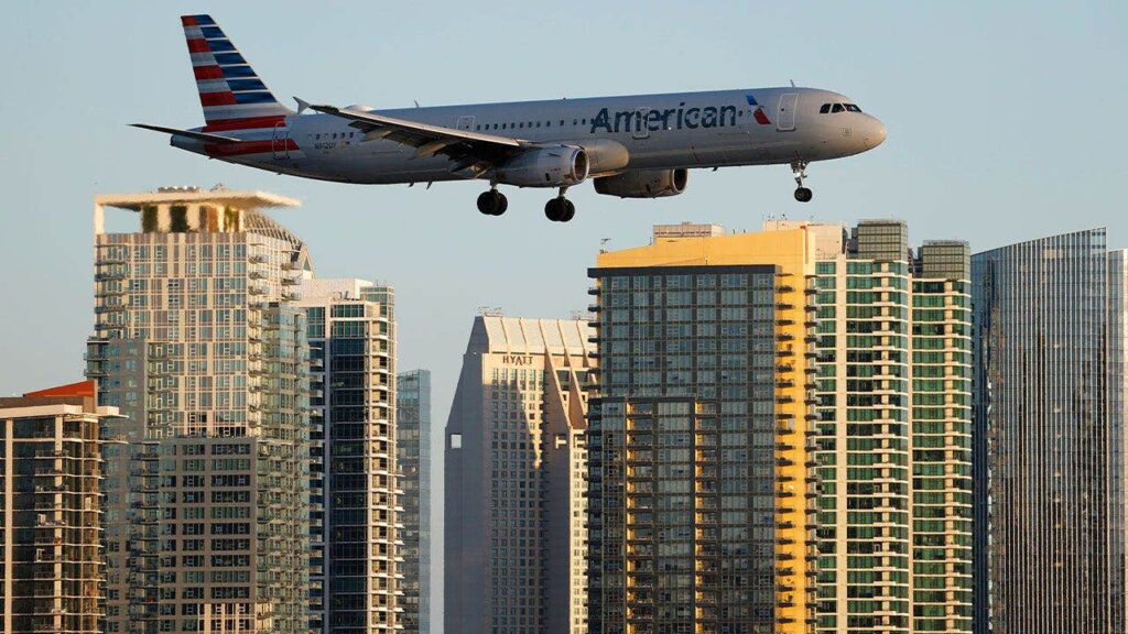 American Airlines flight lands safely at DFW after laptop fire injury