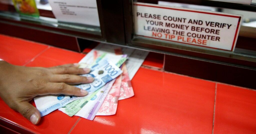 Why has the Philippine peso plunged to a record low? | Financial Markets News