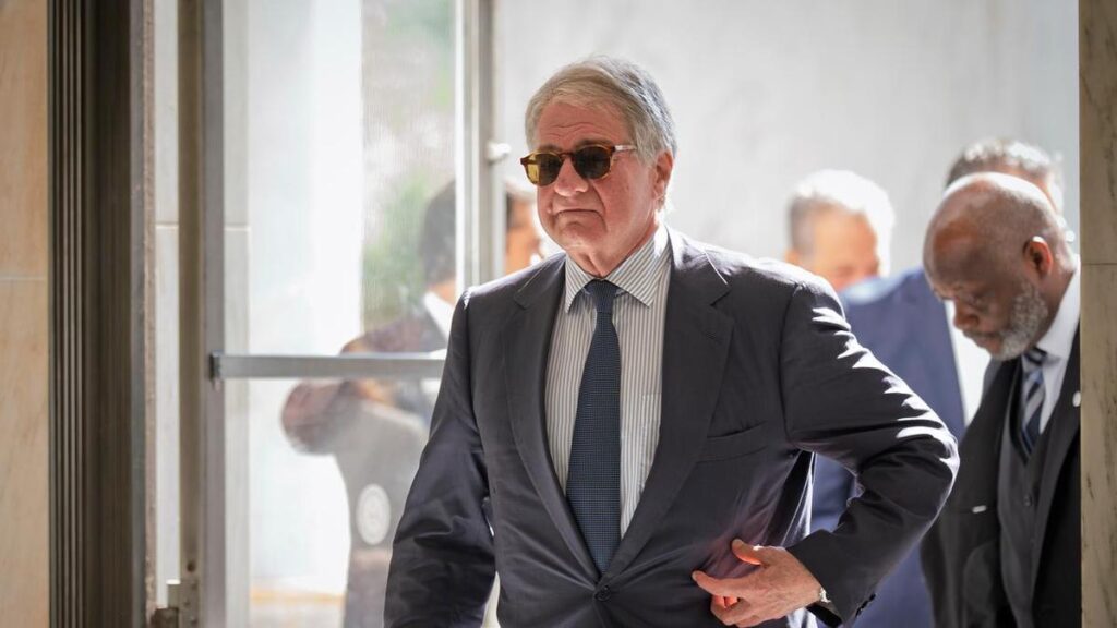 Black skips Epstein deposition, sues US House committee
