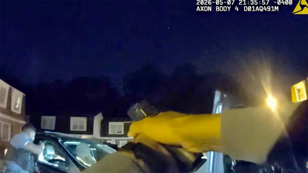 Maryland carjacking suspect hits officer, shot by police, body cam video shows
