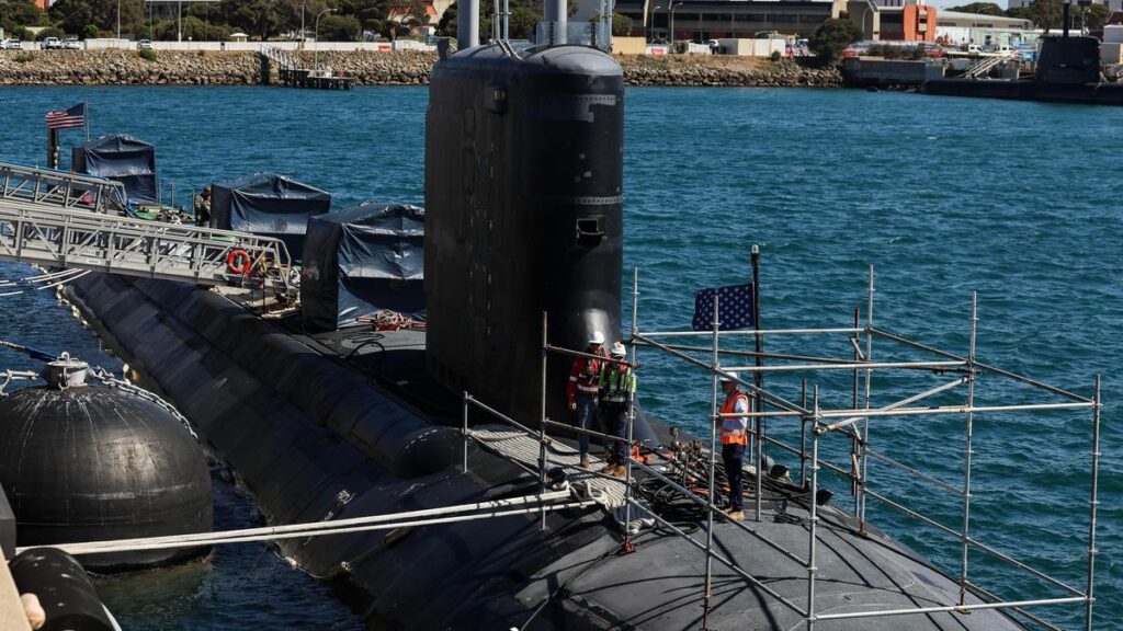 Armed guards patrol HMAS Stirling as US nuclear submarine USS Colorado undergoes major maintenance in WA
