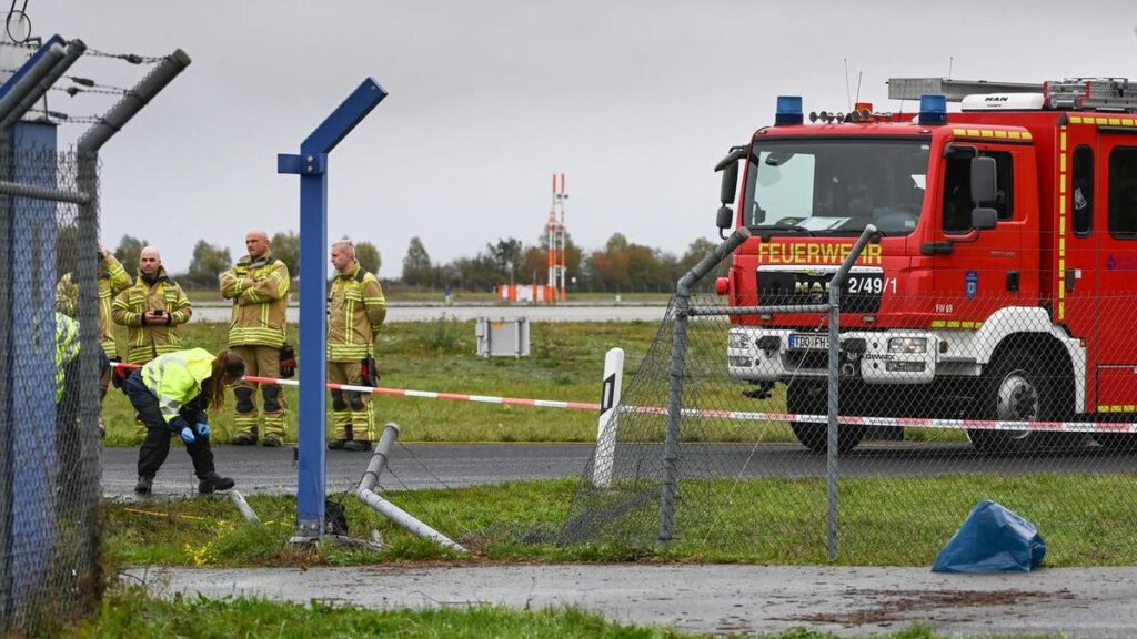 Two turn themselves as fence breached at German airport