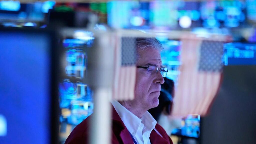 Wall Street dips on surging US Treasury yields