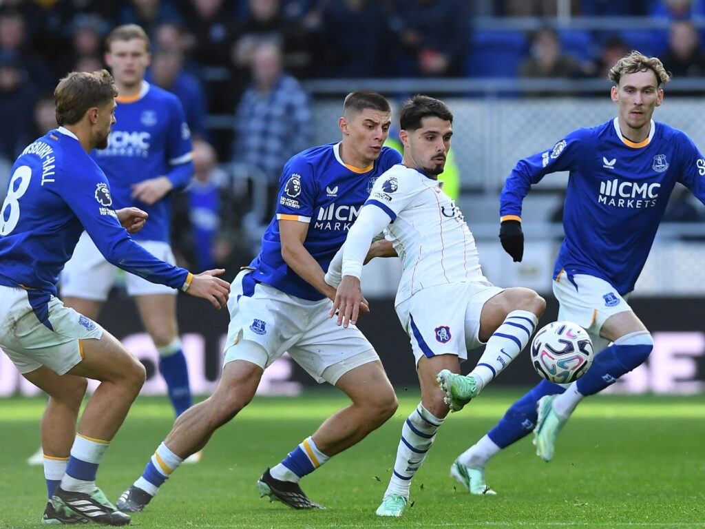 Neto’s brace fires Chelsea past Everton but Martinez head injury mars win | Football